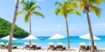 Sun loungers on the beach of Carlisle Bay resort in Antigua