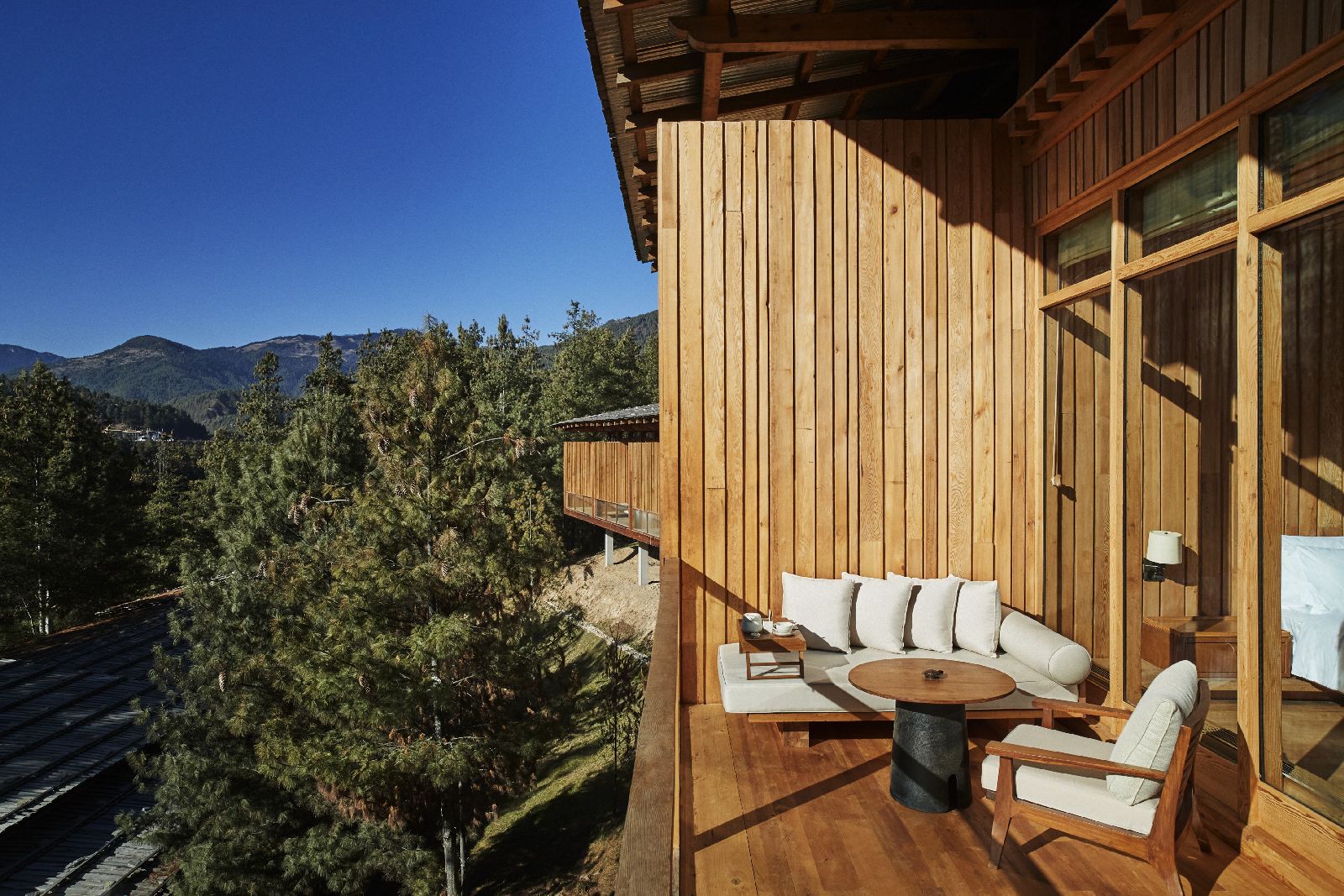 Forest views from a suite terrace at Six Senses Bumthang in Bhutan