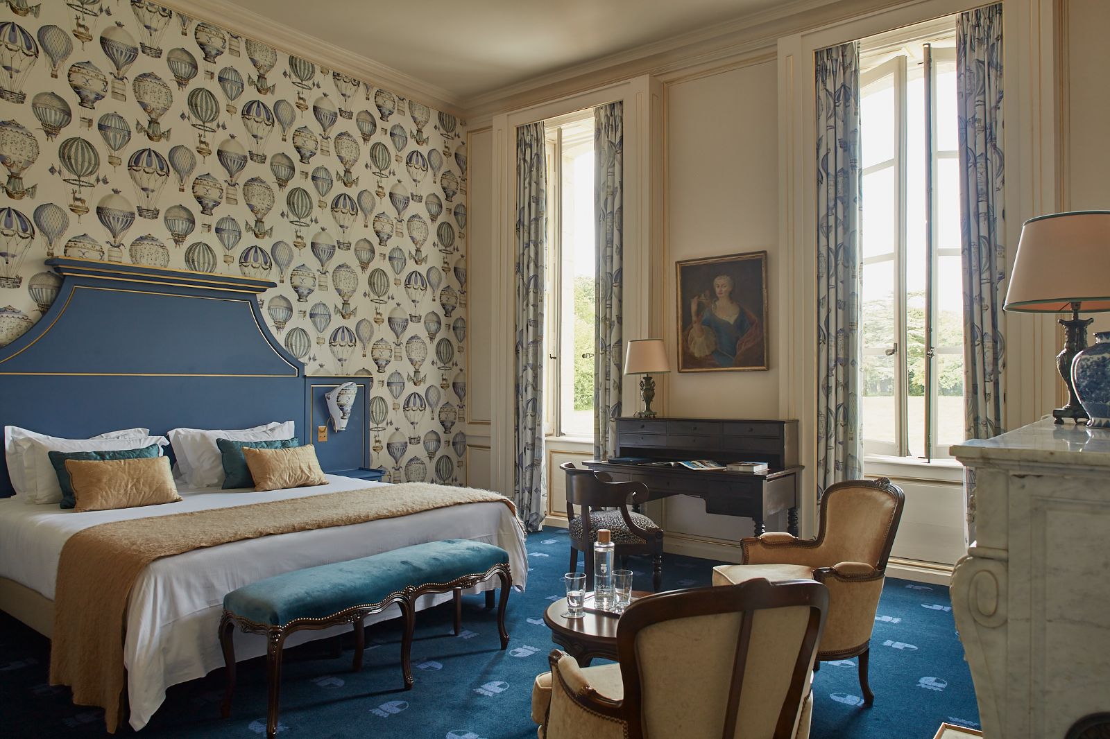Blue guest suite at Chateau d'Audrieu in the Normandy region of France