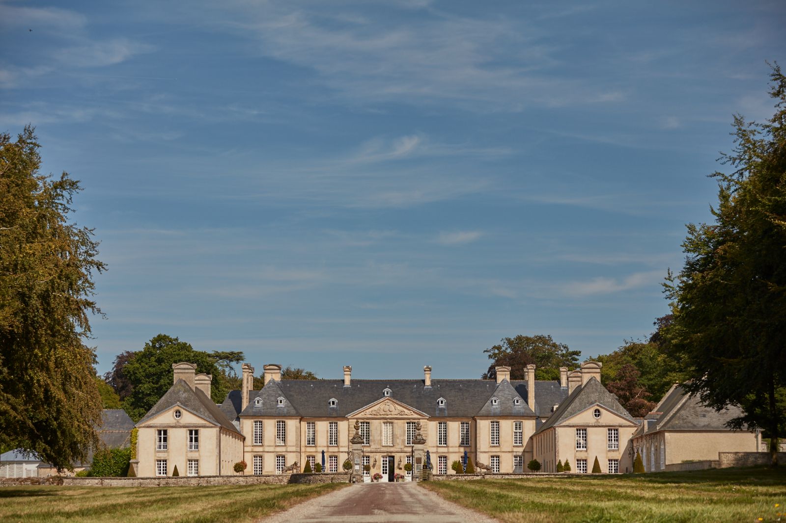 Driveway and exterior of Chateau d'Audrieu in the Normandy region of France