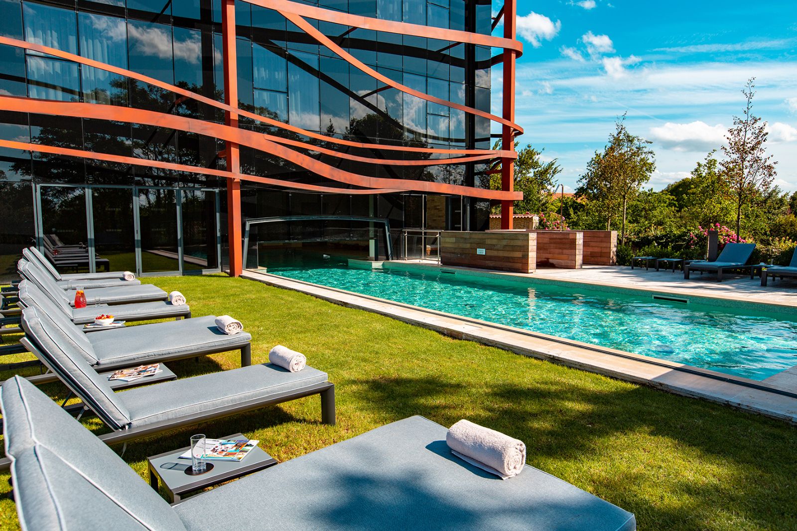 Outdoor pool area at Hotel Chais Monnet & Spa in South West France
