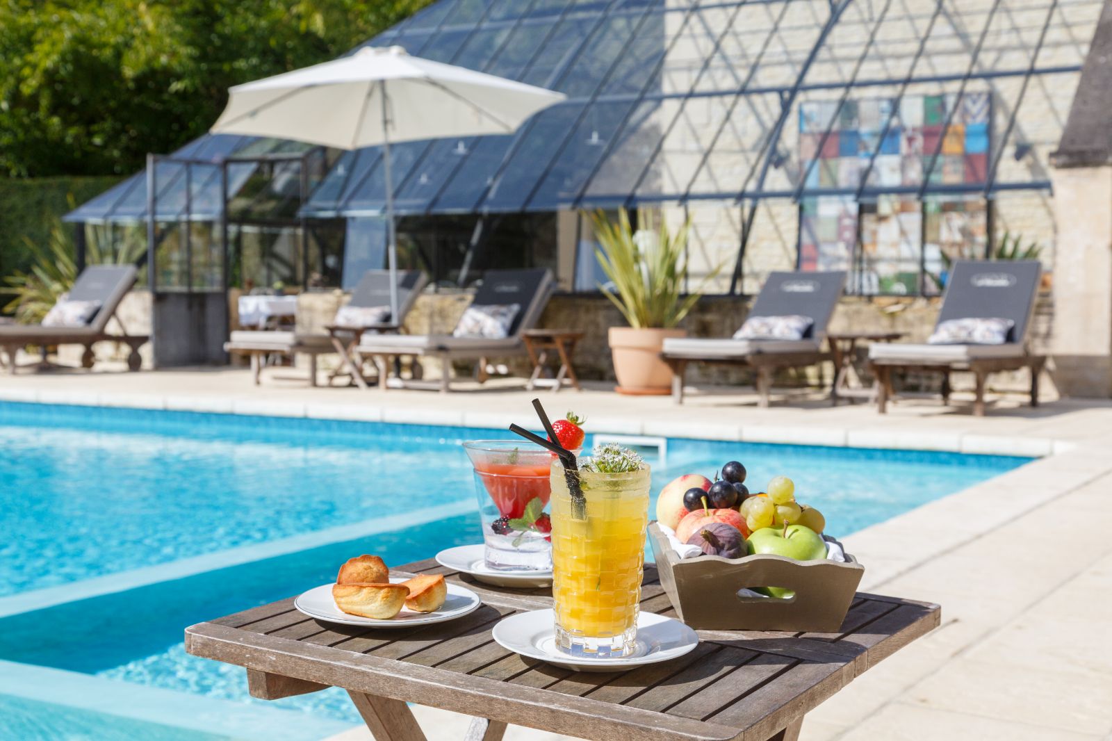Food at the poolside at Chateau La Cheneviere in the Normandy region of France