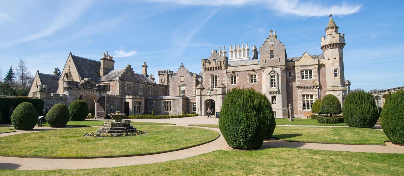 Exterior view of Abbotsford House on the banks of the River Tweed in Scotland