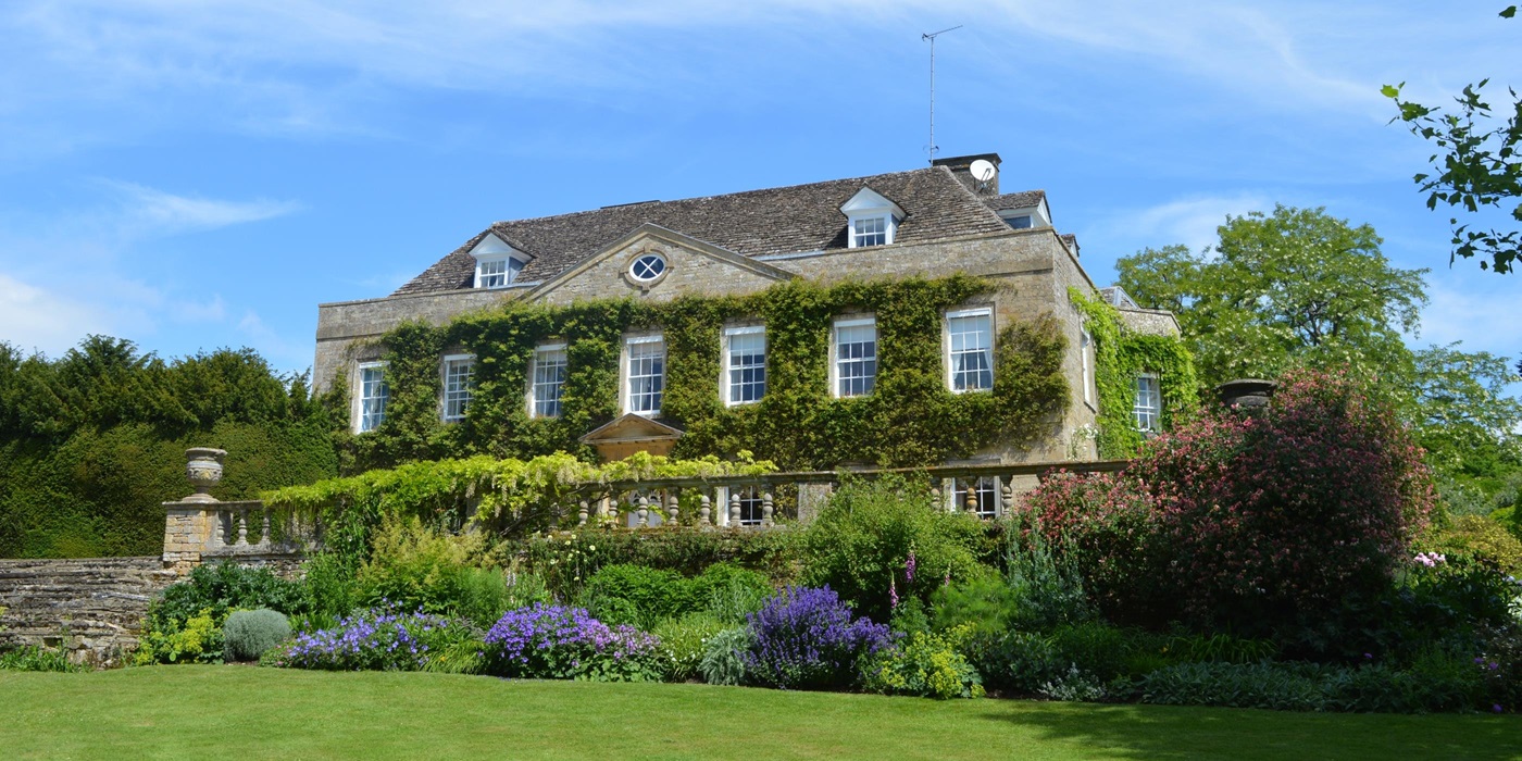 Facade with grounds of Cornwell Manor, Cotswolds
