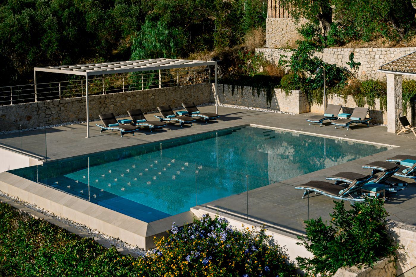 Pool with terrace at Villa Leonidas