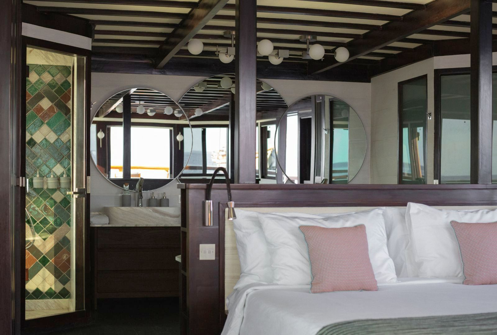 Guest bedroom onboard the Vela Phinisi in Indonesia