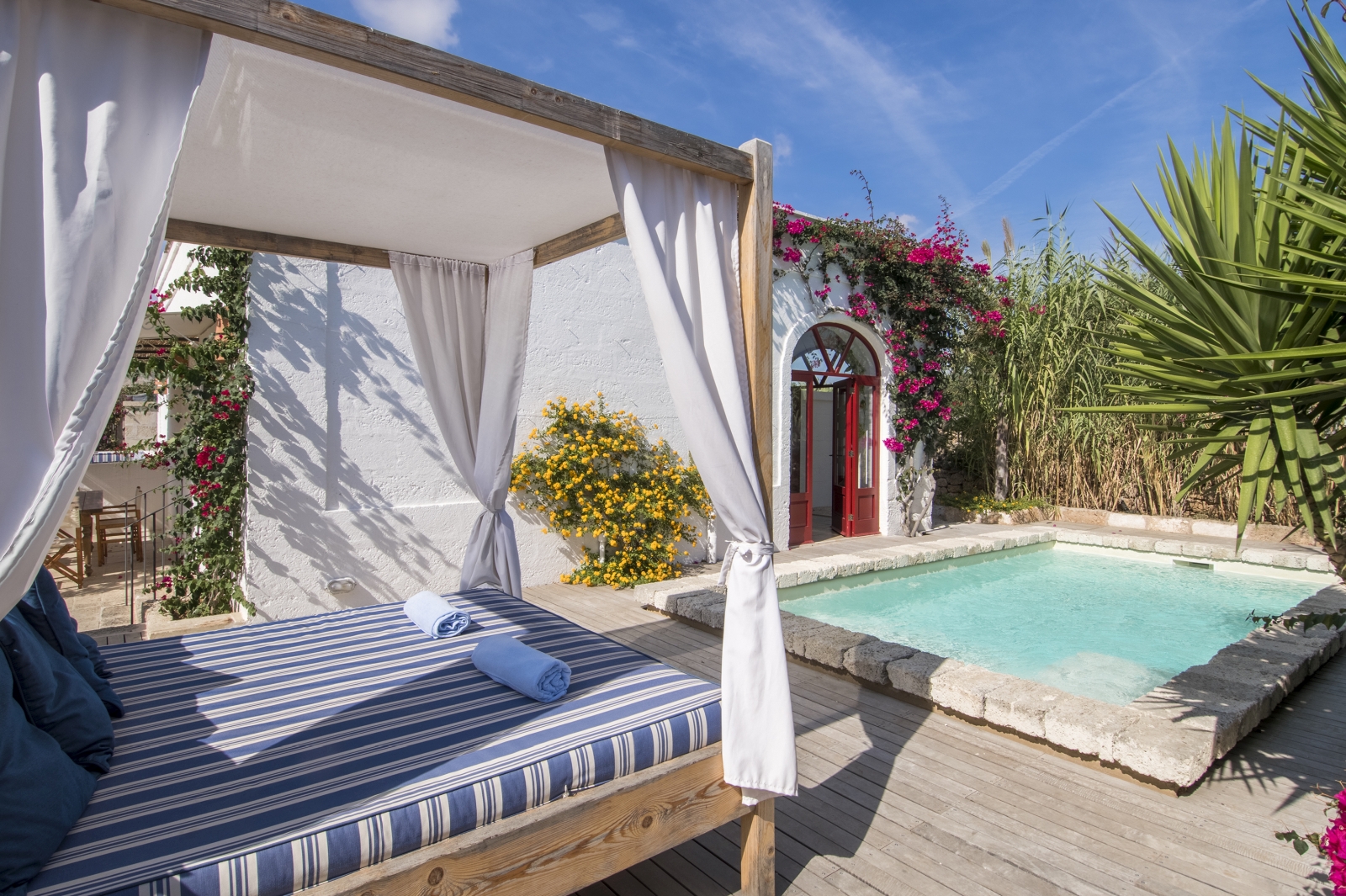 Private pool and pool cabana of an Olive Suite at luxury hotel Masseria Torre Coccaro in Italy