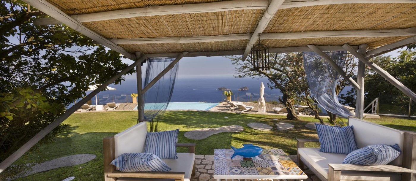 the covered outdoor seating area at ensuite master bedroom in Villa li Galli, Amalfi Coast