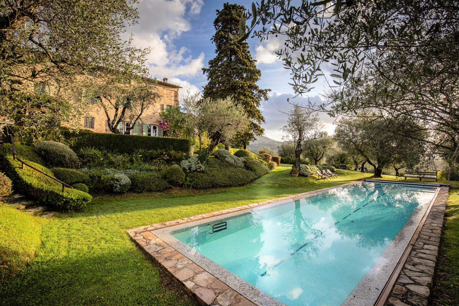 Pool and garden at Villa Ortensia, luxury villa in Lucca, Tuscany, Italy