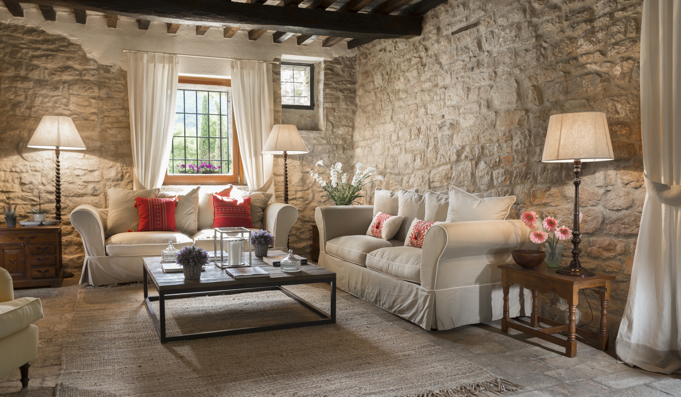 The stone-walled living room of Villa la Lavanda, Umbria