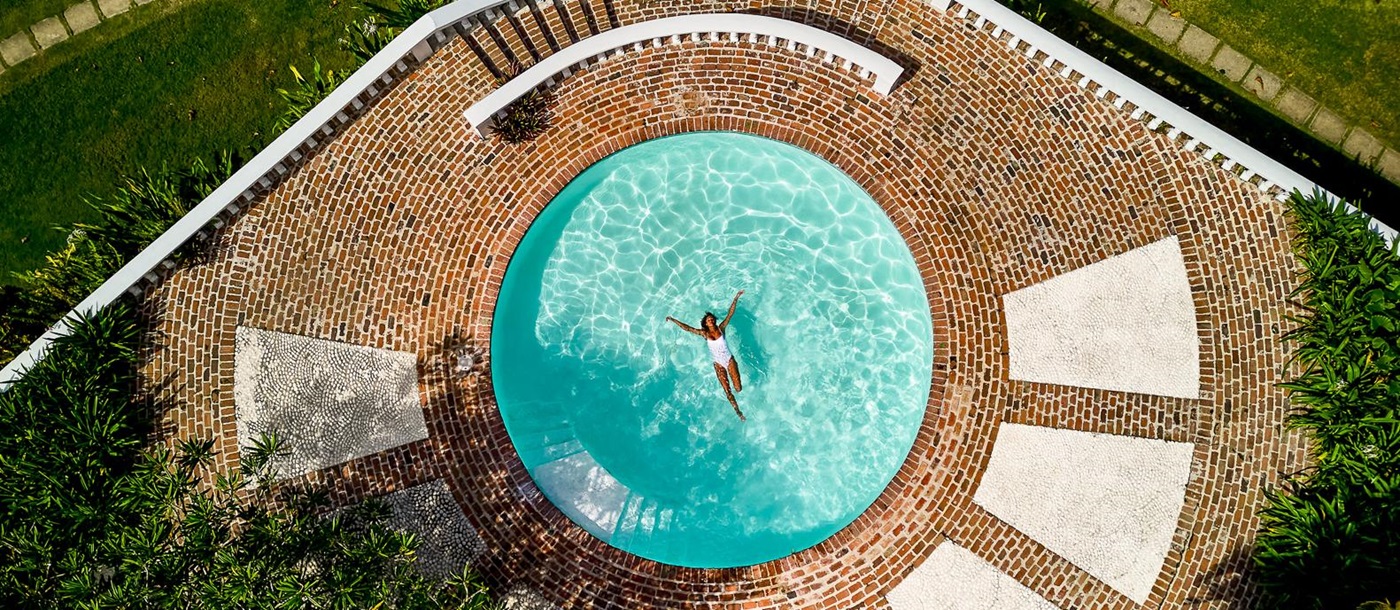 Aerial view of the swimming pool at Round Hill resort in Jamaica