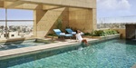 Swimming pool with city views at the Fairmont Amman Jordan