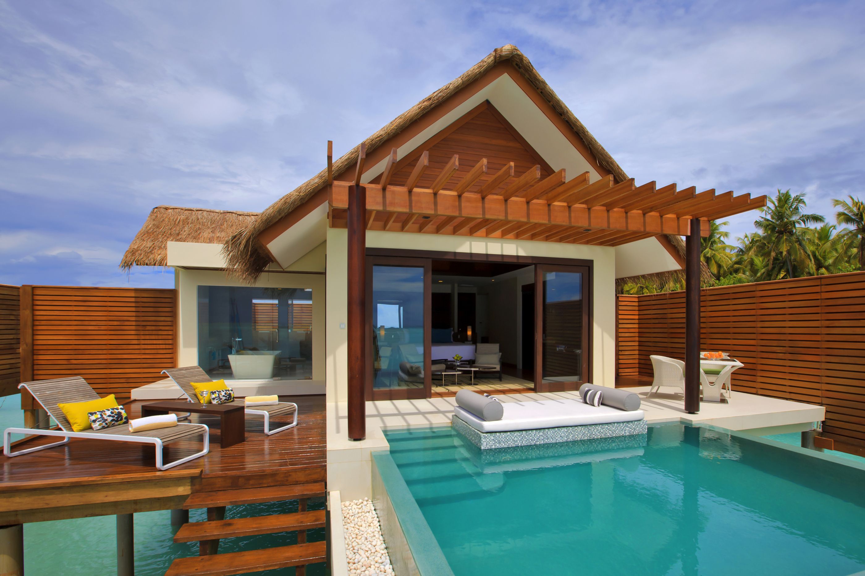 Exterior and swimming pool of a Water Studio at Niyama, Maldives