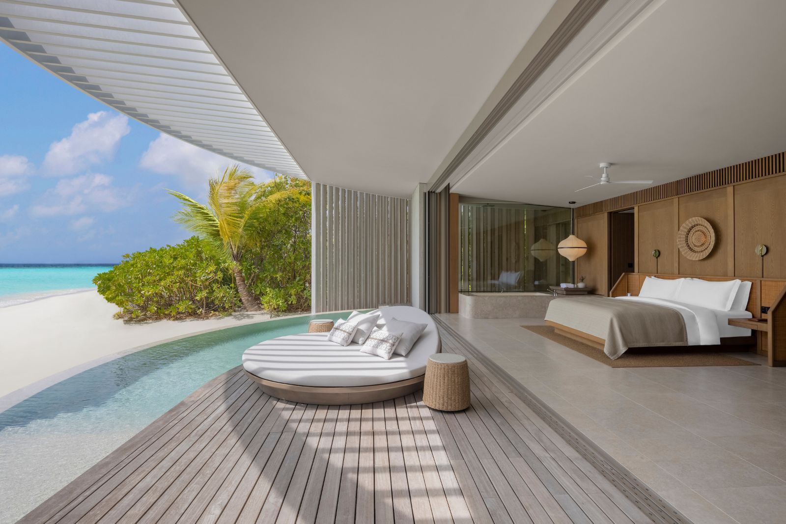 Sunset Beach Pool villa bedroom at Ritz Carlton Maldives