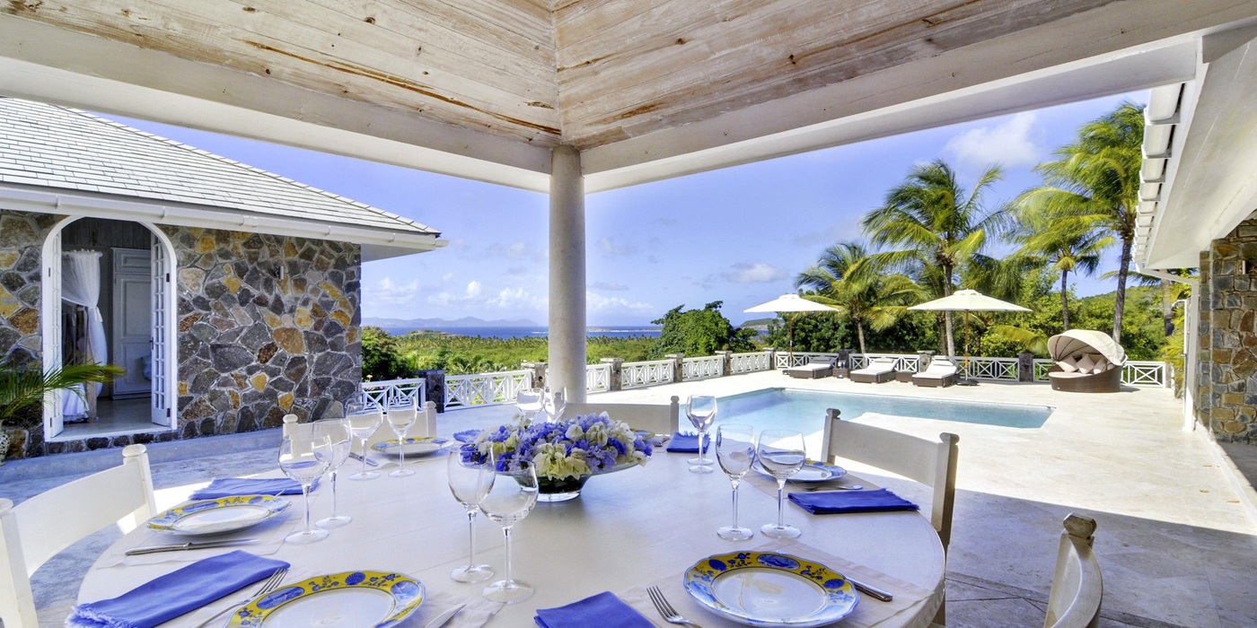 Outdoor dining at Baliceaux, Mustique