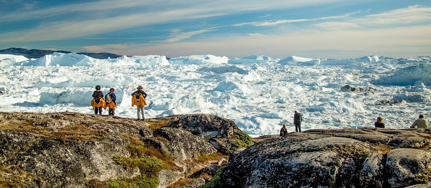 Guests of Quark Expeditions' Ultramarine viewing High Arctic scenery