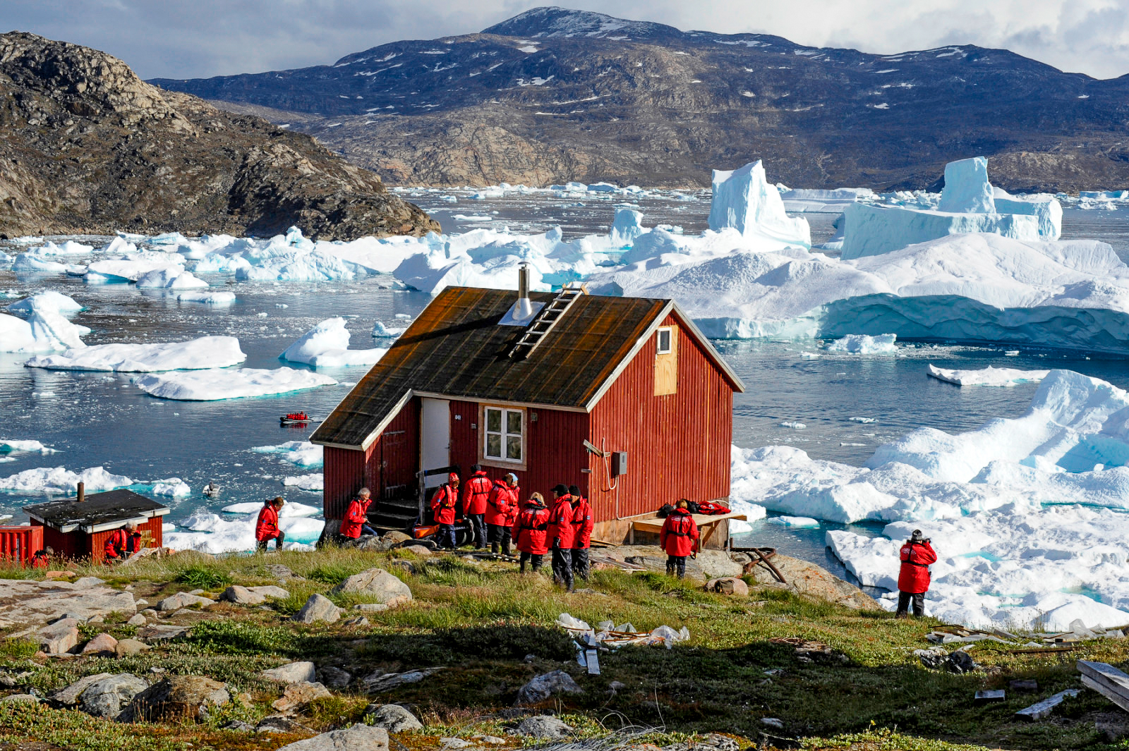 An Arctic house viewed by guests of a Ponant Arctic cruise