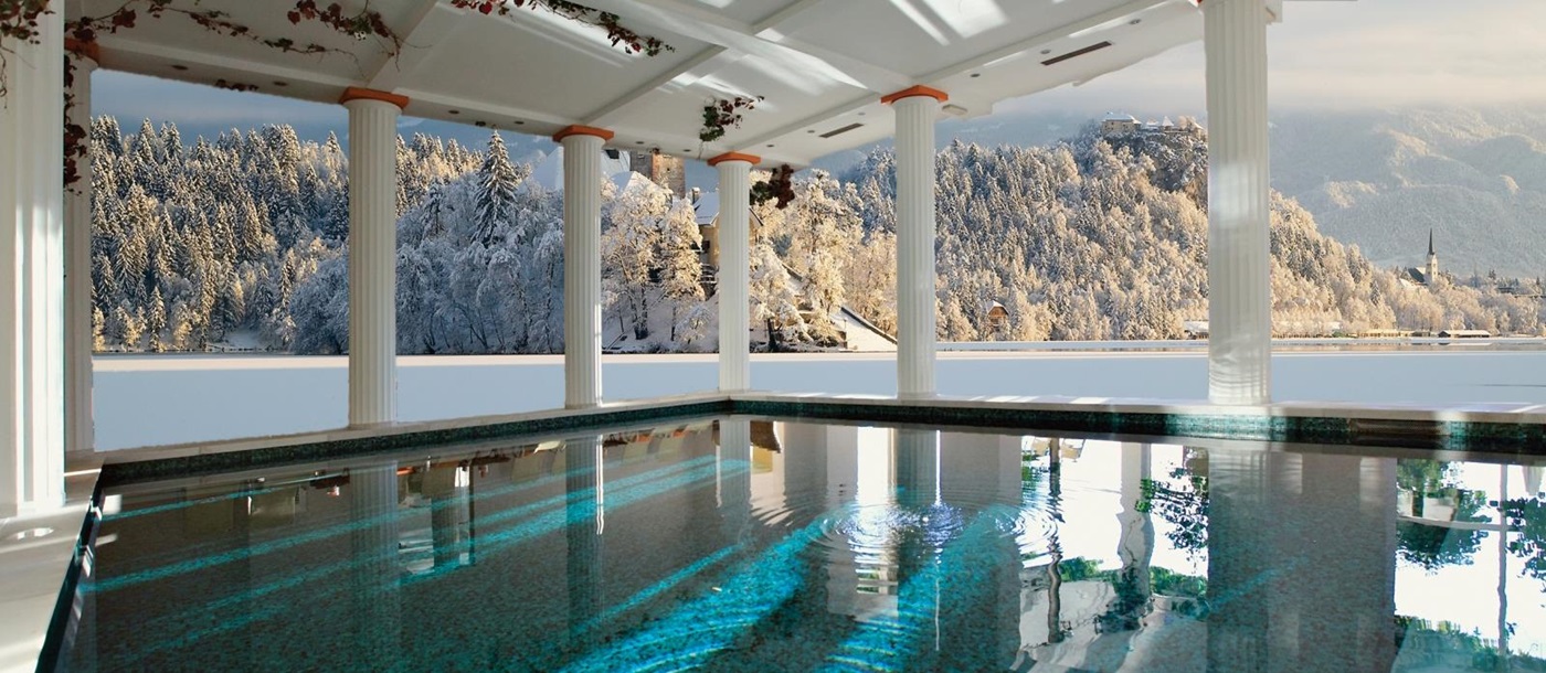 Indoor pool with views of lake at Grand Hotel Toplice in Slovenia