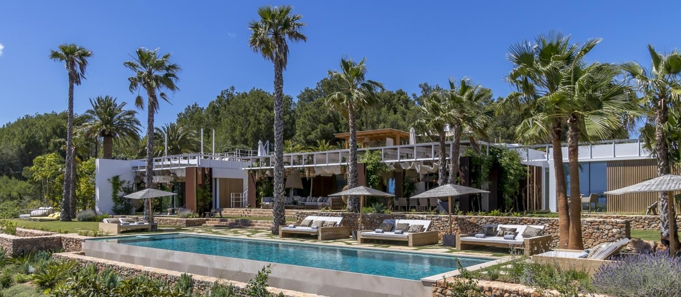 exterior view of Villa Josep, with the pool and loungers