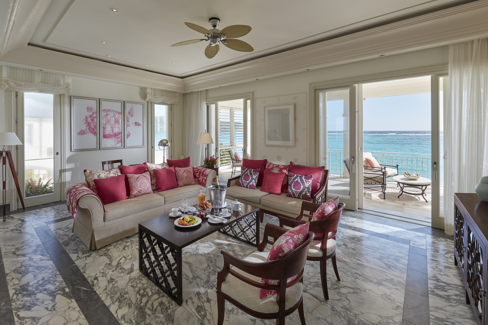 The living room of the Penthouse Suite with a terrace overlooking the ocean
