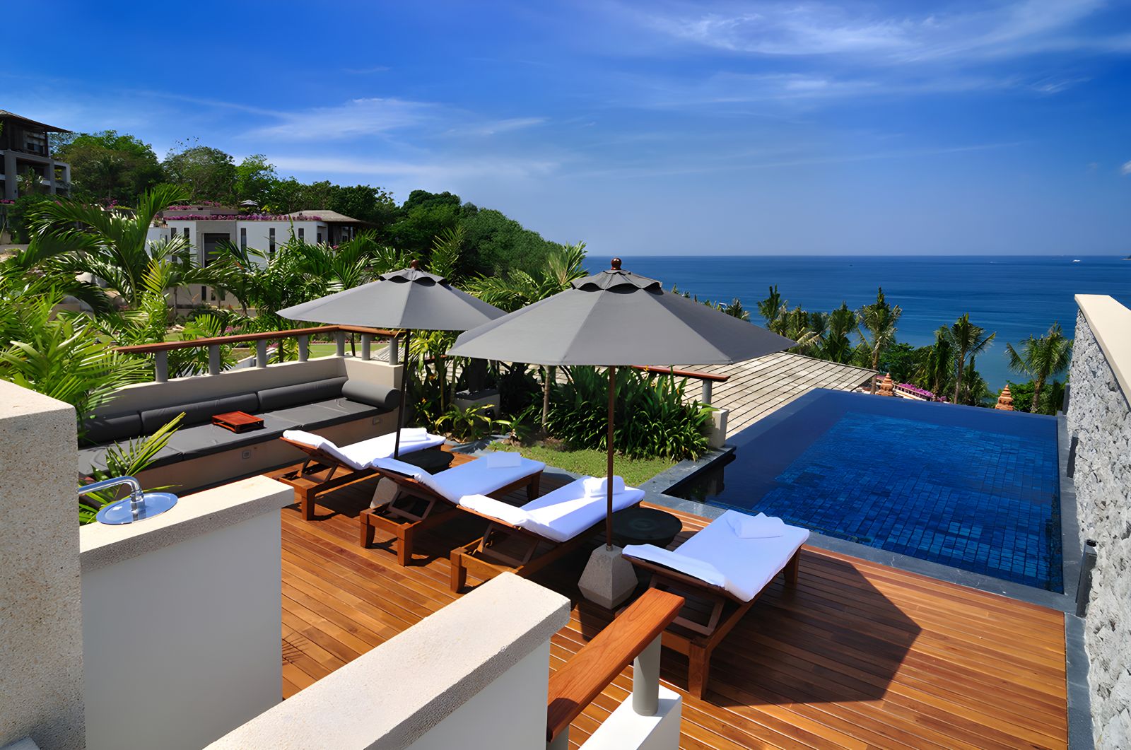 Sunbeds and rooftop pool at Andara Resort & Villas in the Phuket region of Thailand