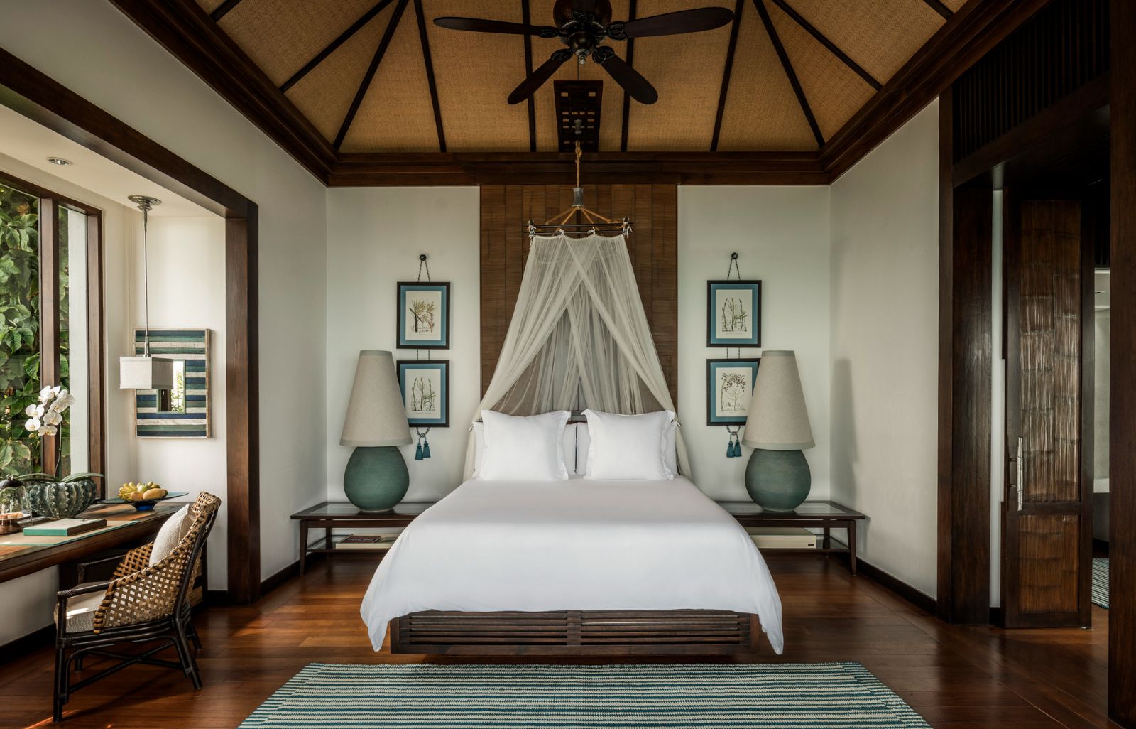 Guest suite bedroom at Four Seasons Resort Koh Samui in Thailand