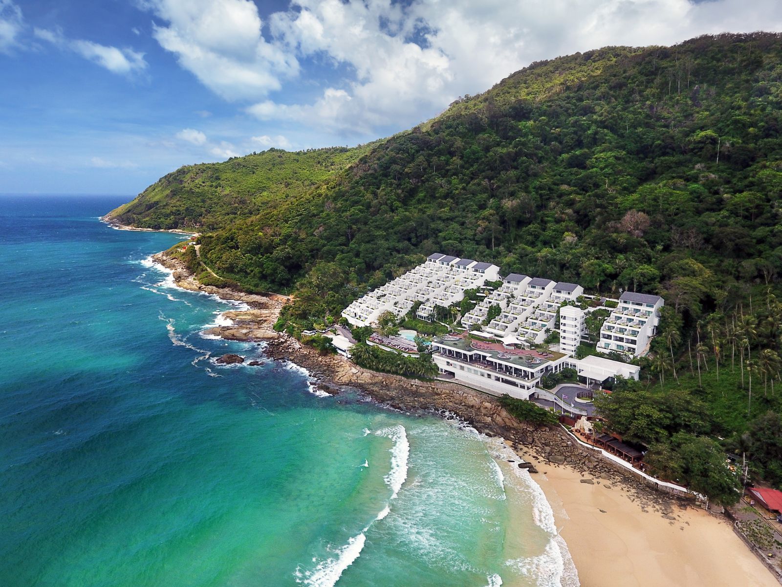 Aerial view of sea, beach and The Nai Harn resort in the Phuket region of Thailand