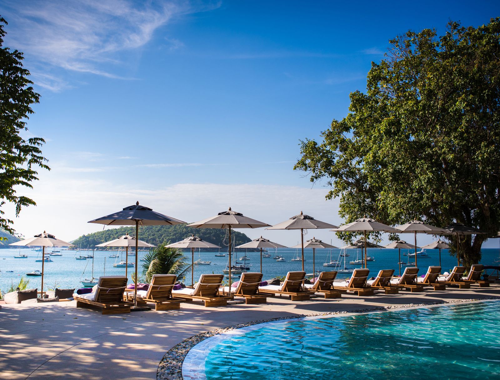 Poolside and ocean view at The Nai Harn resort in the Phuket region of Thailand