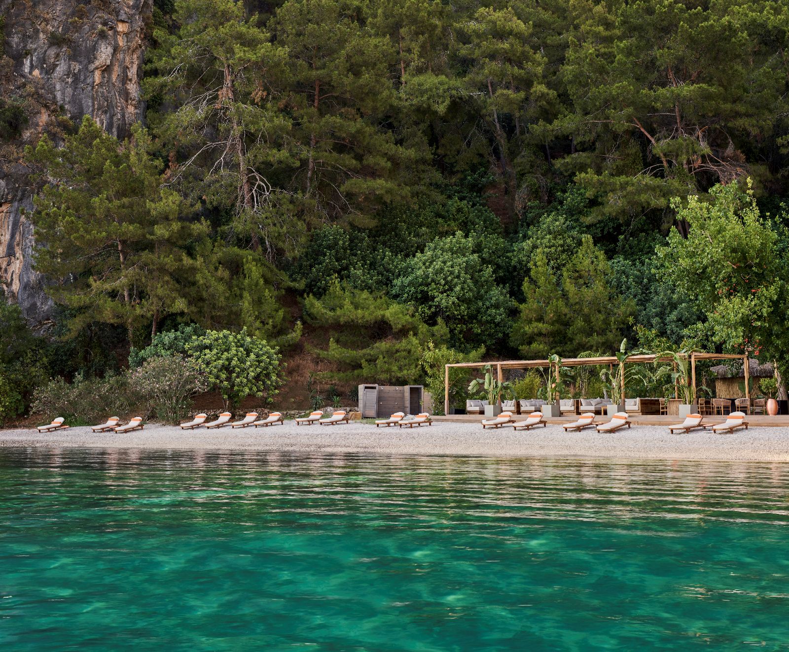 Emerald waters in the cove at the Yazz Collective near Fethiye Turkey