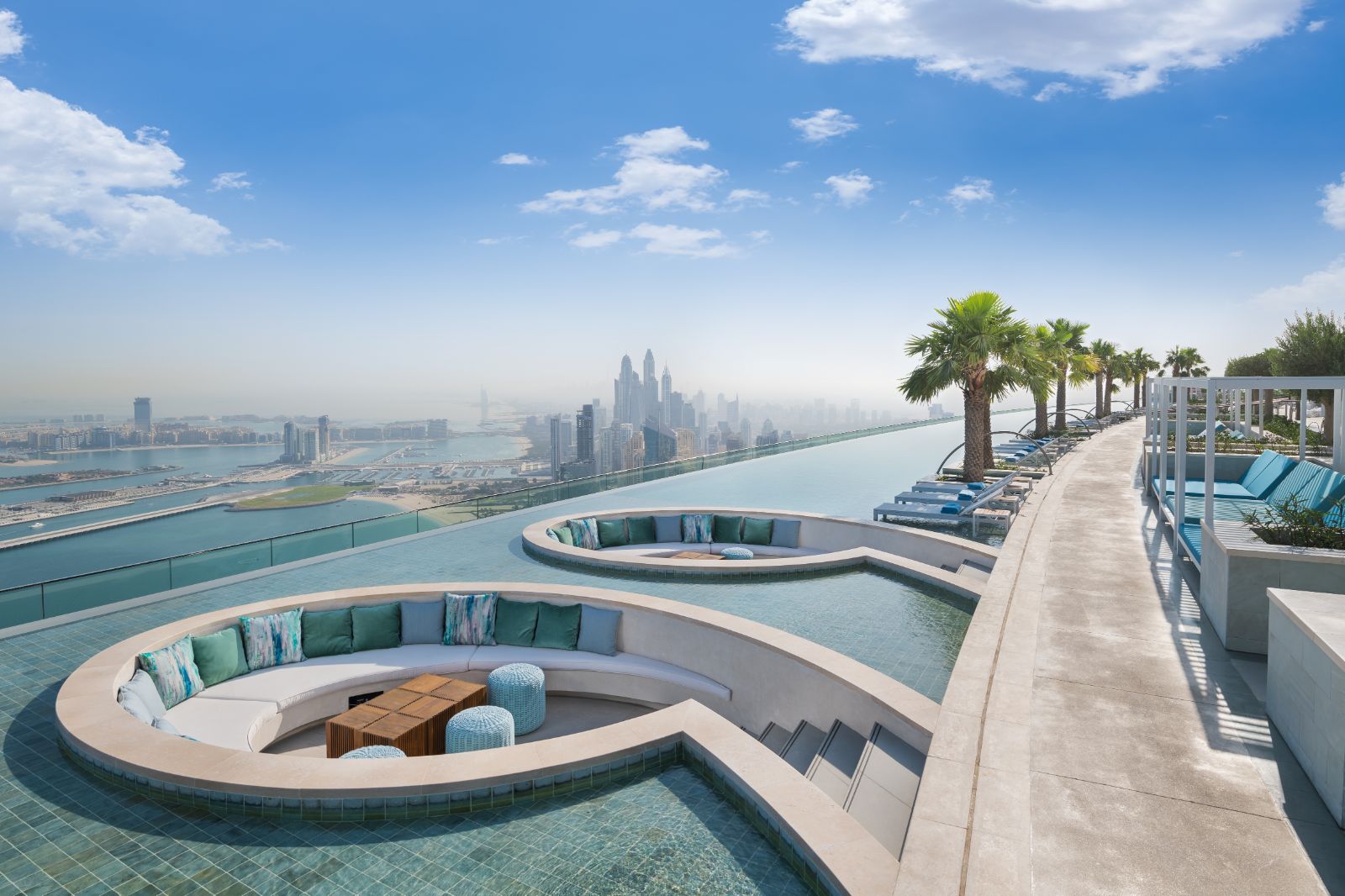 Sunken seating area at the 77th floor pool at luxury resort Address in Dubai