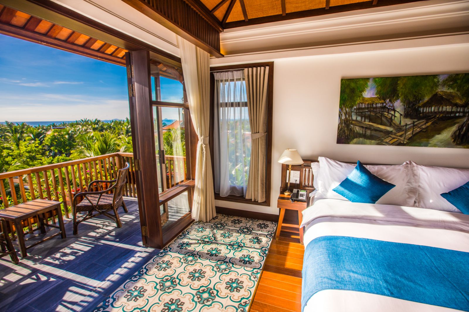 Private villa bedroom and balcony at The Anam resort in Cam Ranh, Vietnam