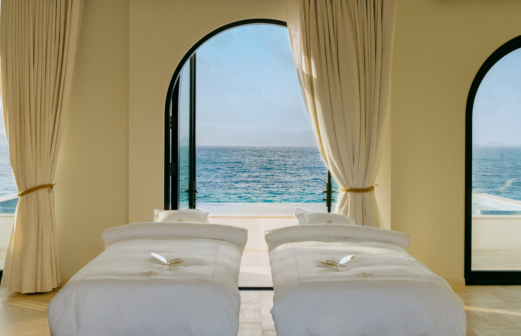Spa beds with ocean views at Belmond's Cap Juluca resort in Anguilla