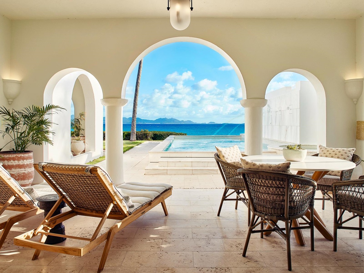 A terrace with ocean views at Belmond's Cap Juluca resort in Anguilla
