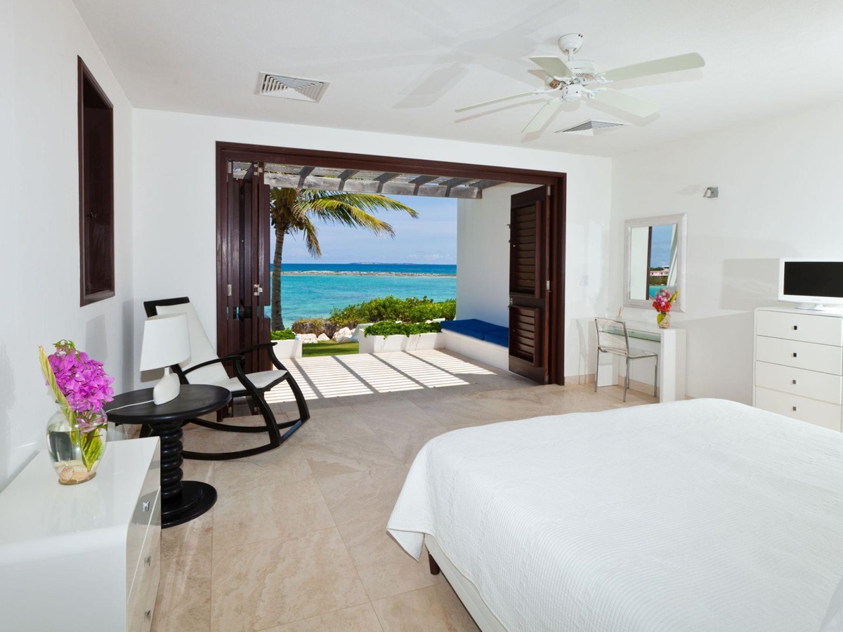 double bedroom with sea view of le bleu, anguilla