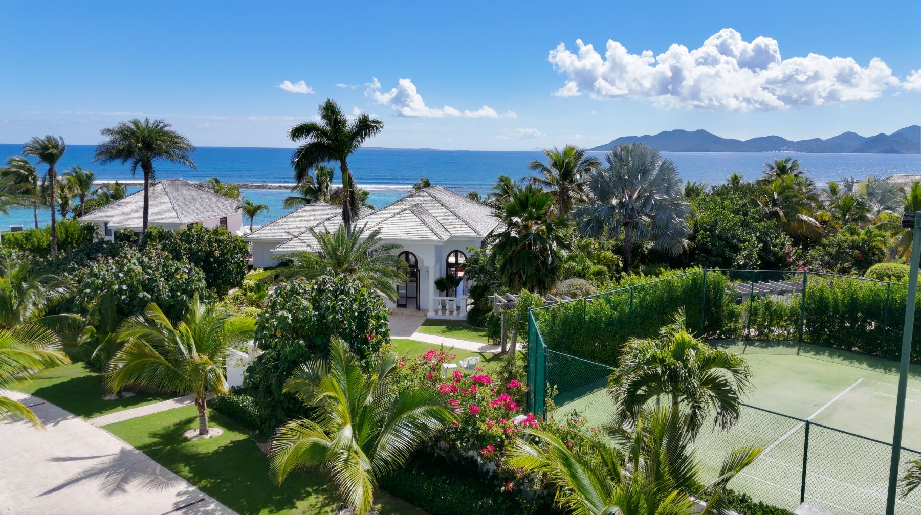 Front Exterior and Tennis Courts at Villa Indigo in Anguilla 