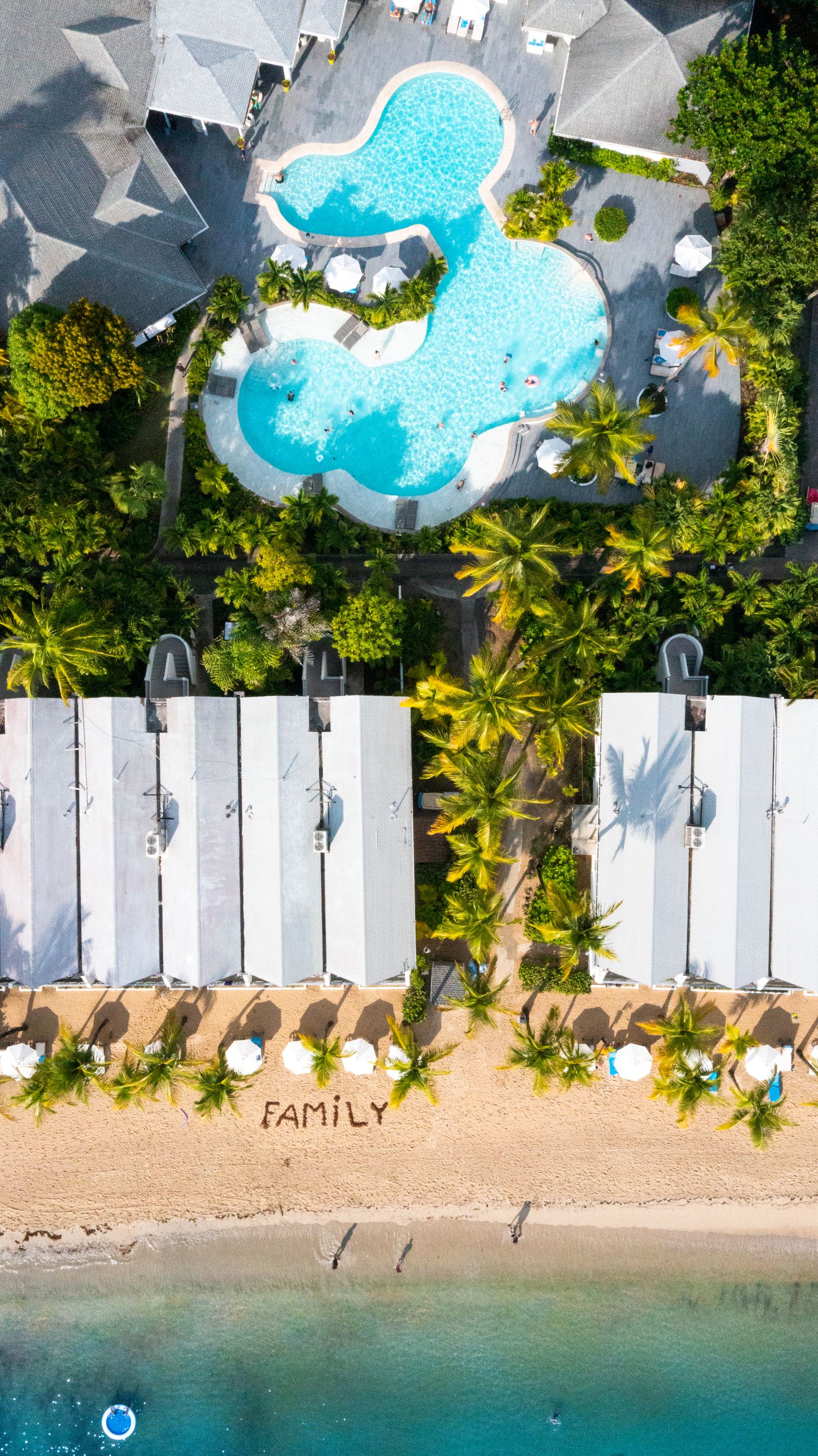 Aerial view of the pool and beach at Carlisle Bay resort in Antigua