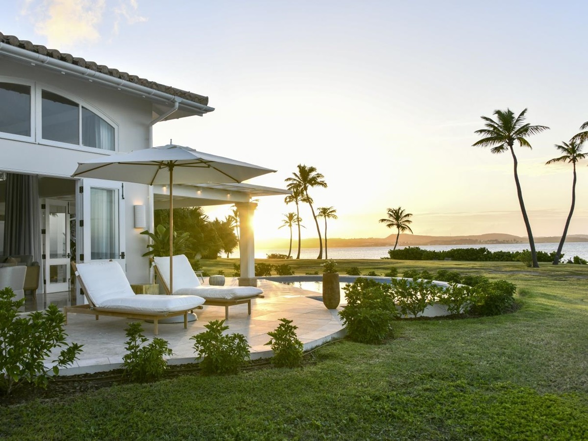 Sunset over a villa with private pool and terrace
