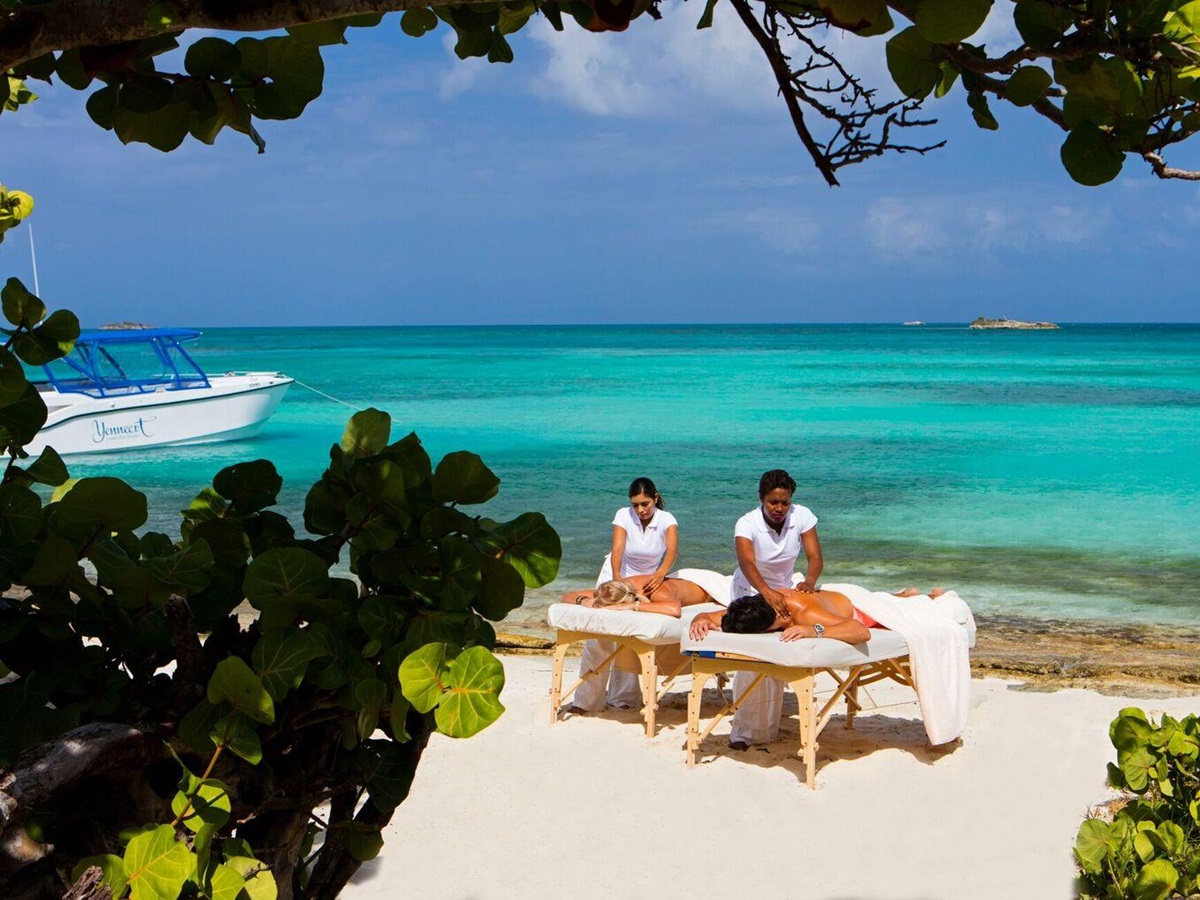 Massage on a beach at Jumby Bay, Antigua
