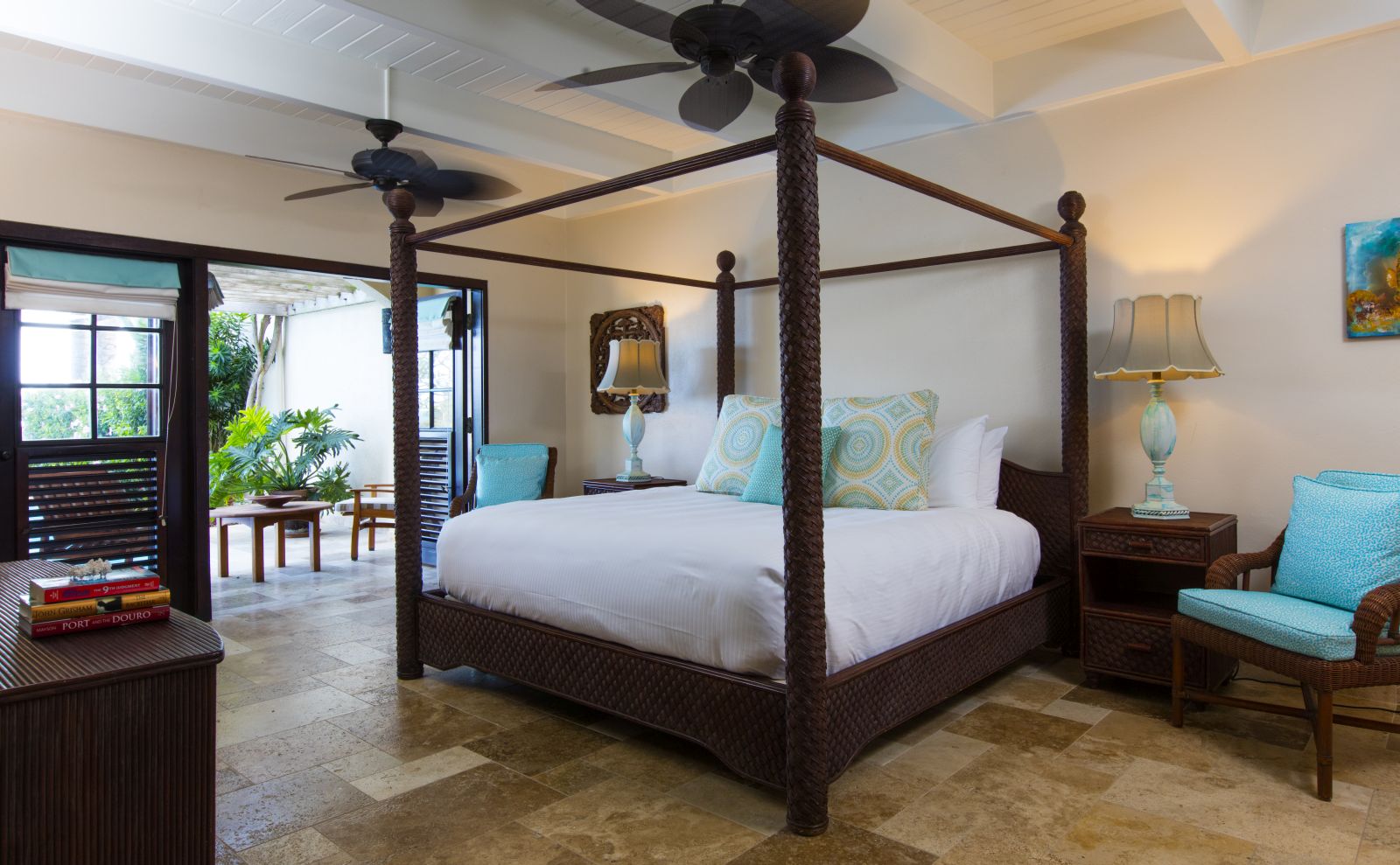 Bedroom with four poster bed in Banyan Villa