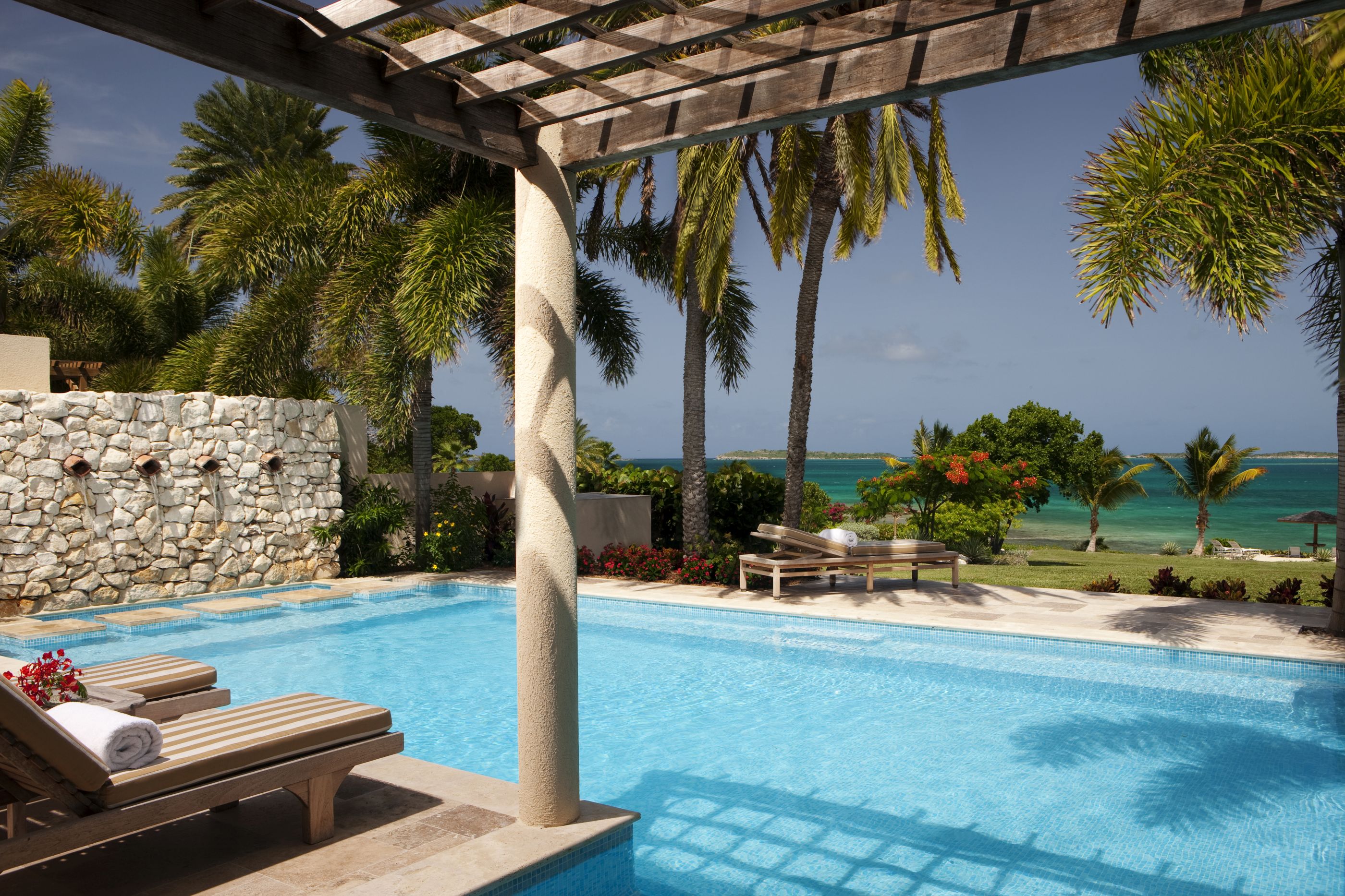 Pool area with sea view at Banyan Villa, Antigua