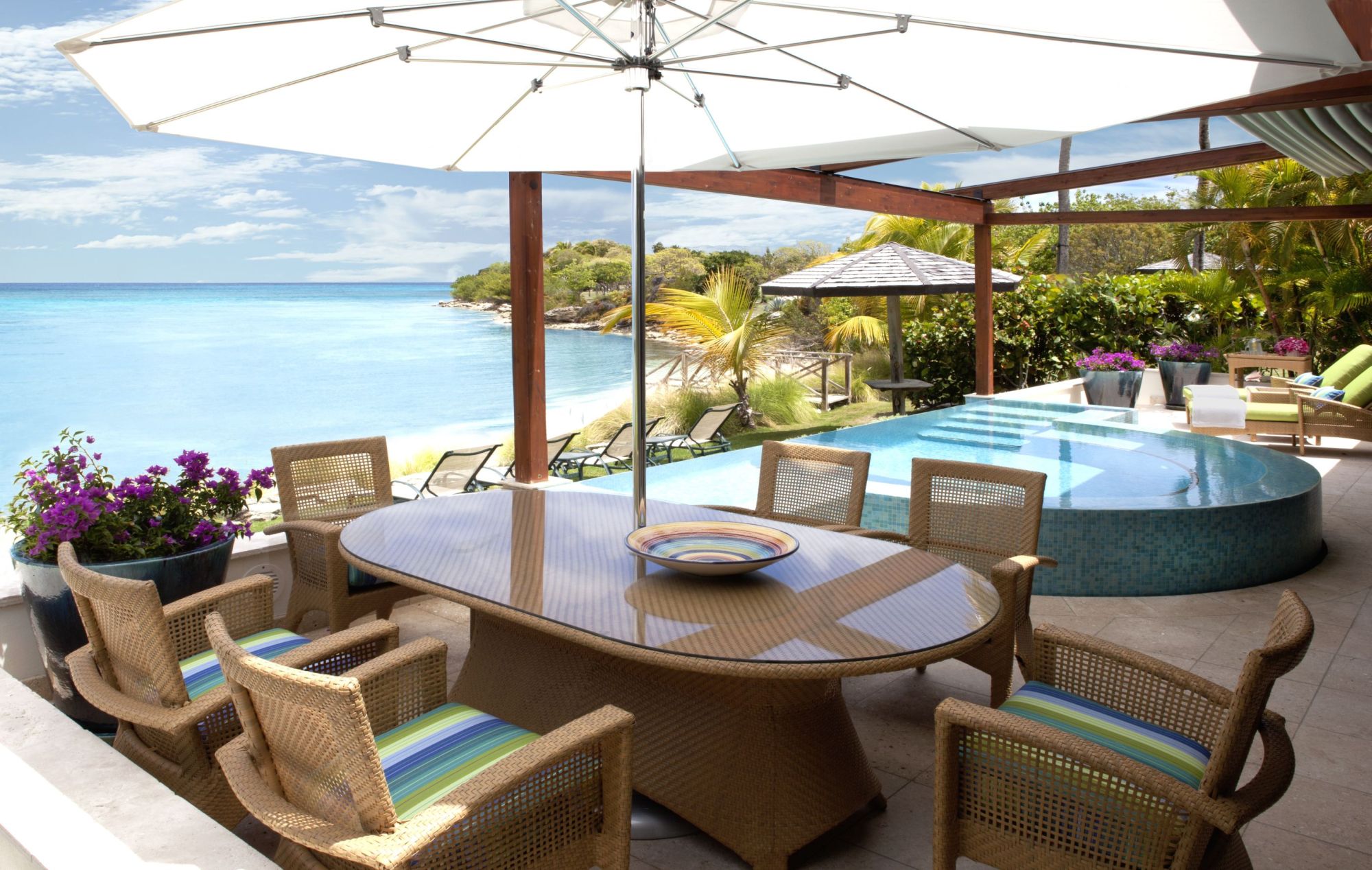 The pool terrace at Hummingbird, Jumby Bay, Antigua