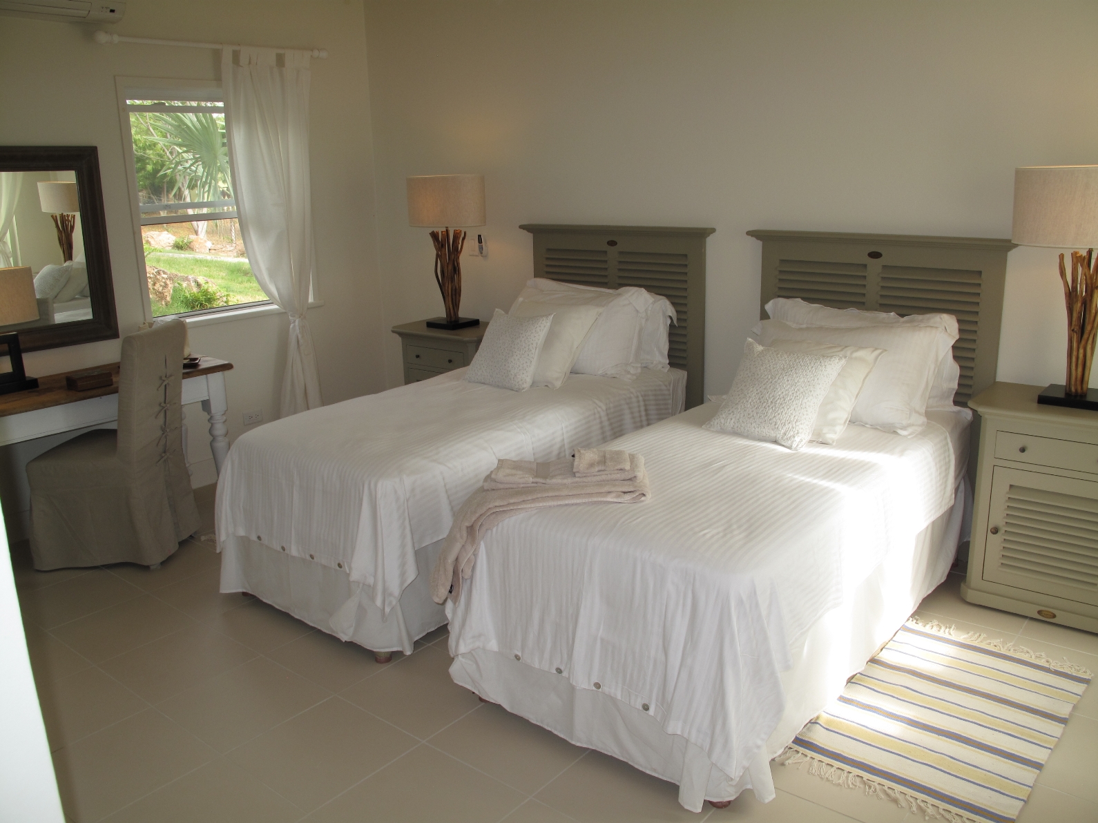 The twin bedroom of Pigeon Beach House, Antigua
