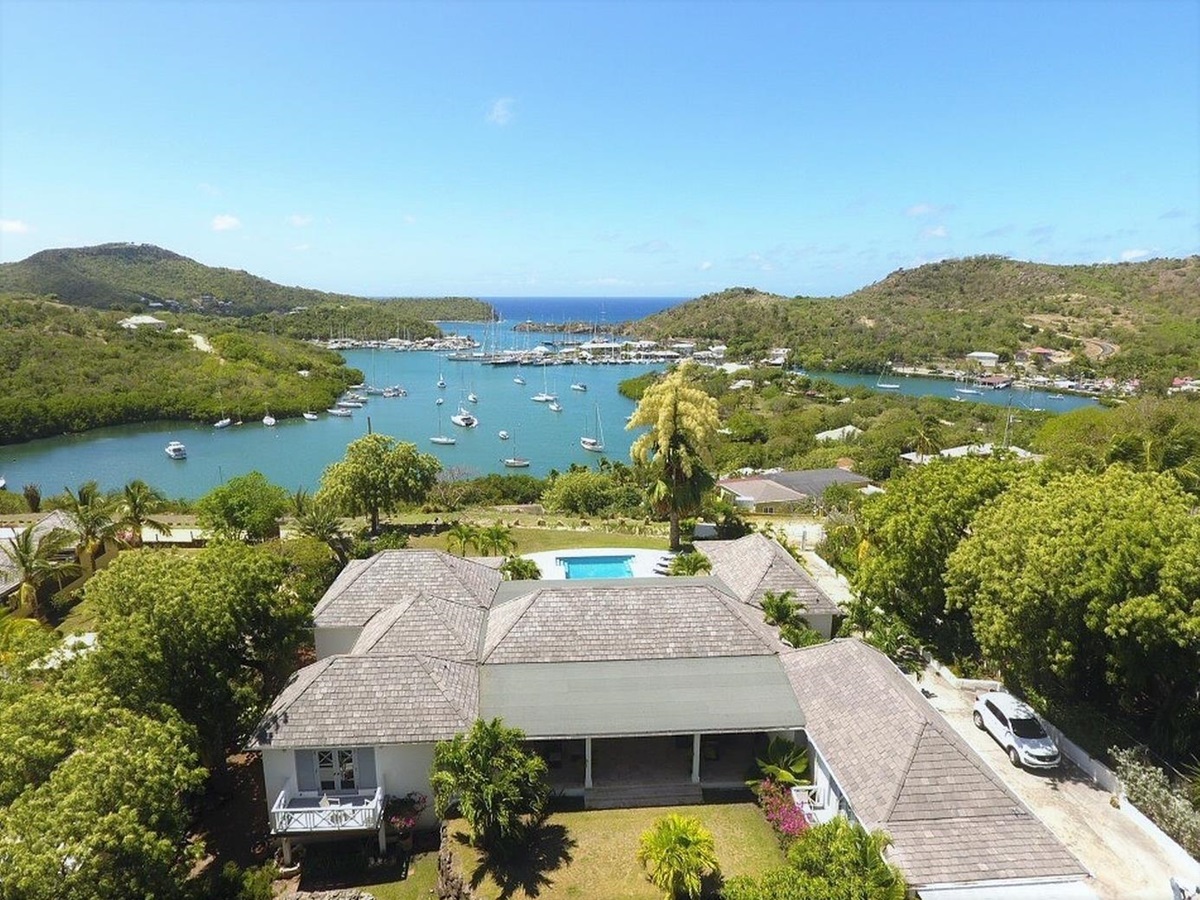 Aerial over the roof of The Hill Club with views of English Harbour