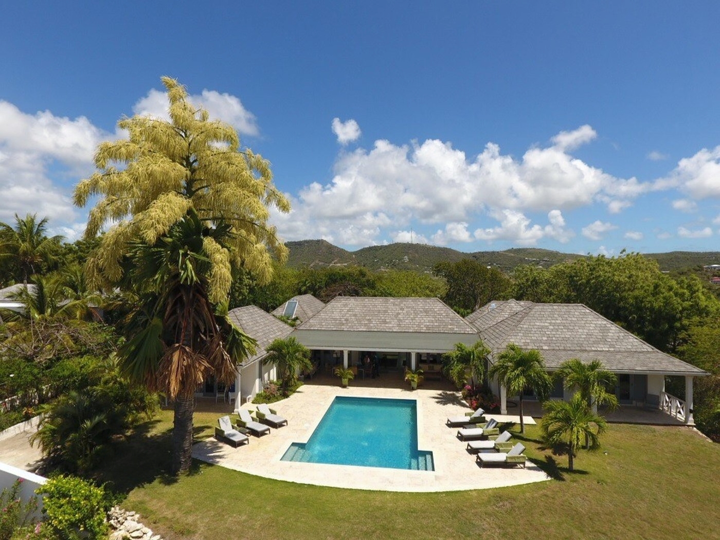 Aerial of the pool area and front of The Hill Club villa in Antigua