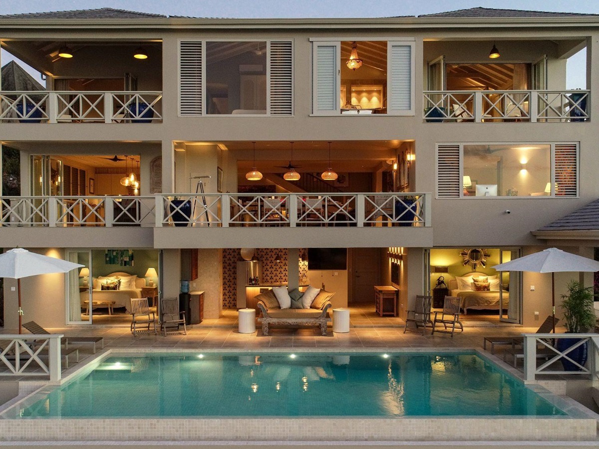 Exterior view of the front aspect and pool at Villa Papillon