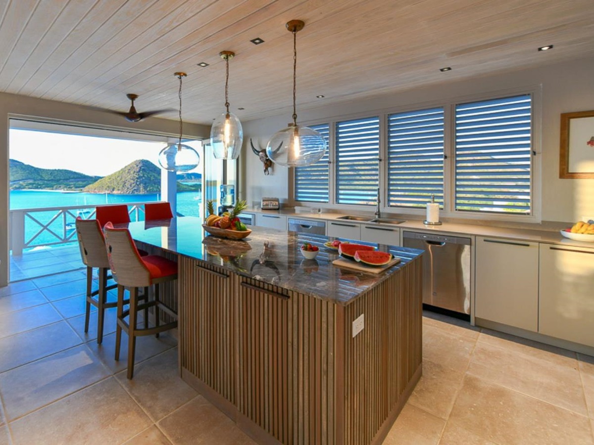 Kitchen and breakfast bar at Villa Papillon