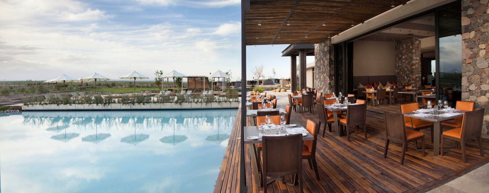 Poolside restaurant seating at The Vines Resort & Spa in Argentina's Uco Valley