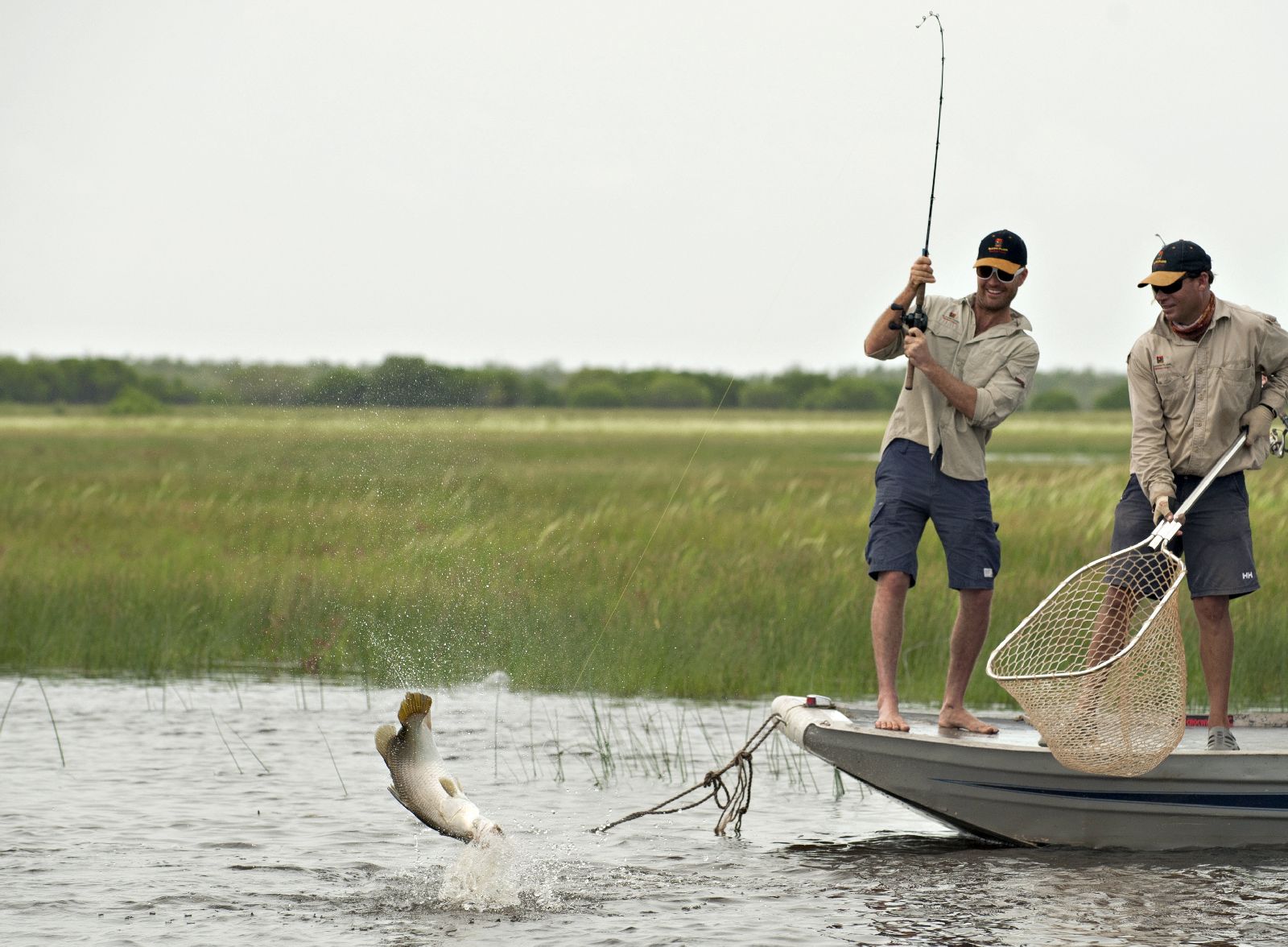 Guests fishing in the Mary River from Bamurru Plains in Northern Australia