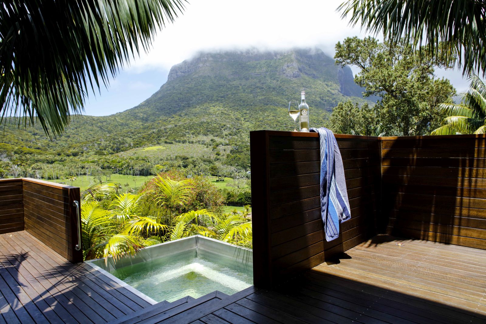 View of a pool and the surrounding landscape at Capella Lodge in Australia