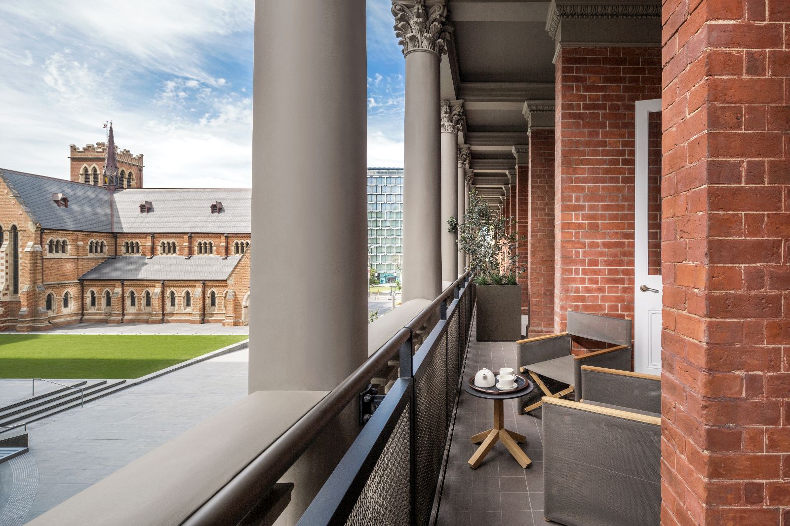 Characterful red brick balcony at COMO The Treasury hotel in Perth Australia